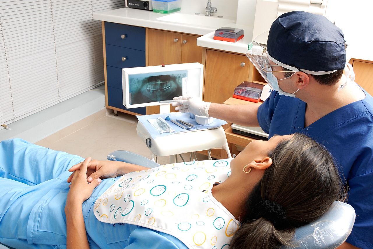 stock photo example of a dentist with a patient commonly found on dental websites