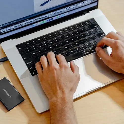 Man optimized Google Business Profile through Laptop